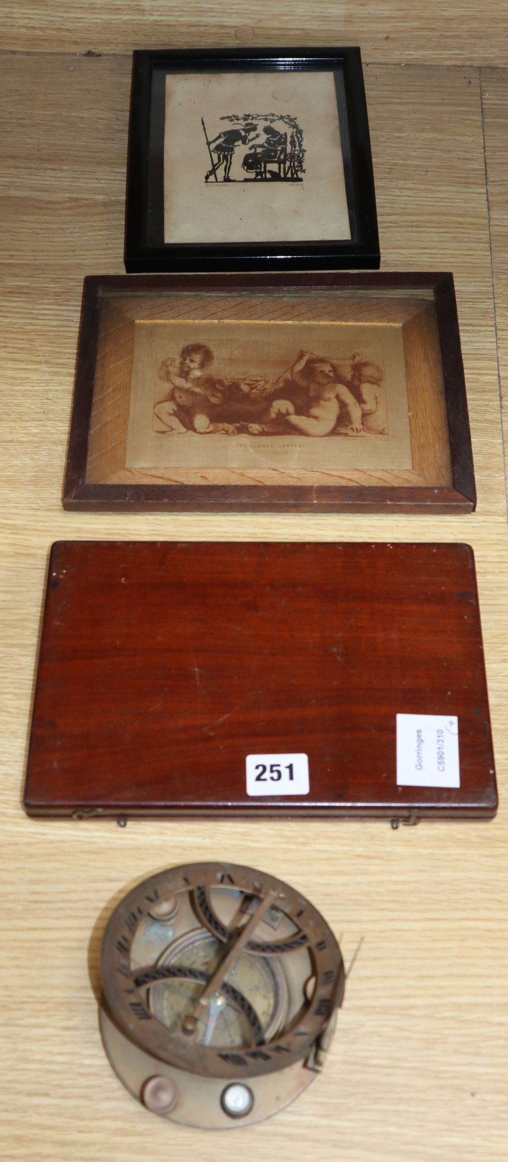 A West London compass / sundial, a cased Troughton & Simms protractor and two prints